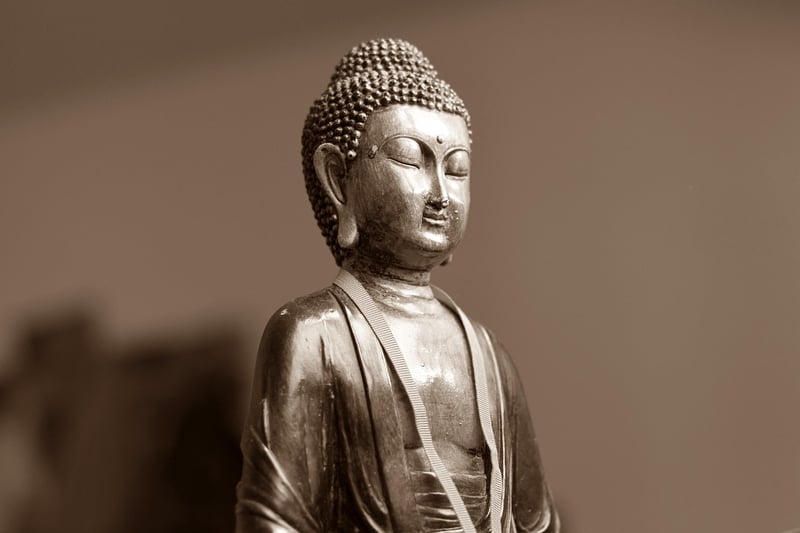 Buddha statue with flowers